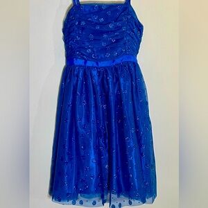 Justice girl’s royal blue special occasion dress. Size 12.